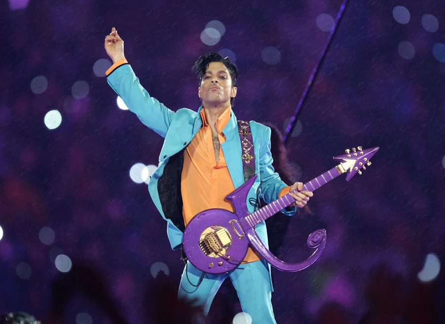 FILE - In this Feb. 4, 2007 file photo, Prince performs during the halftime show at the Super Bowl XLI football game at Dolphin Stadium in Miami. Prince, widely acclaimed as one of the most inventive and influential musicians of his era with hits including Little Red Corvette, Lets Go Crazy and When Doves Cry, was found dead at his home on Thursday, April 21, 2016, in suburban Minneapolis, according to his publicist. He was 57. (AP Photo/Chris OMeara, File)