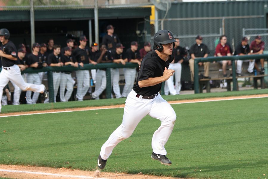 Spencer Rosenbohm, sophomore infielder, sprints to first base after hitting a single against William Carey at Delgado Community College on Friday, April 29.  The baseball team clinched their first ever spot in the SSAC tournament in program history. 