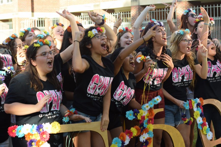 Gamma Phi Beta sisters welcome new members on this year’s Bid Day.  As a Panhellenic Association sorority, Gamma Phi Beta has a strict recruitment structure. Photo credit: Molly Olwig
