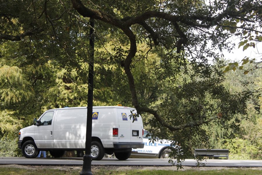 An Orleans Parish Coroner's Office truck sits near the lagoon at Audubon Park, where a woman's body was found the morning of Oct. 10. The coroner has not yet released details on the woman's identity. Photo credit: Alliciyia George