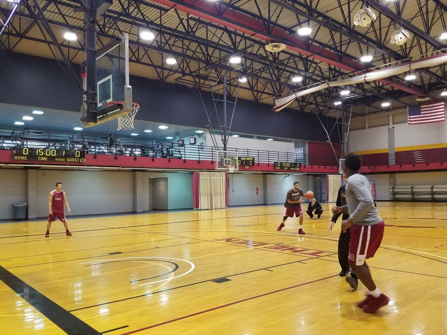 The mens basketball team practices on First NBC court.  The team is off to a strong start this season. Photo credit: Starlight Williams