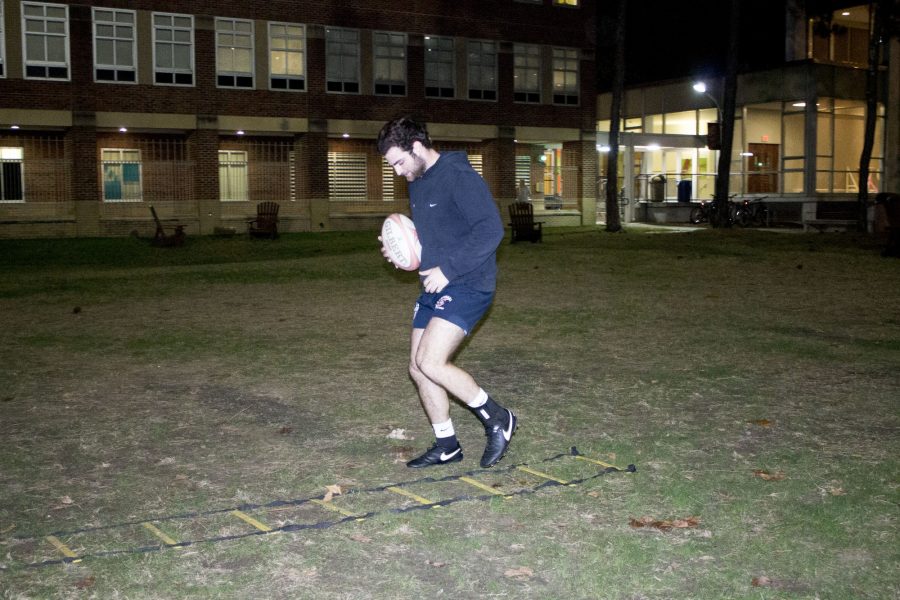 Vincent Duhe warms up in the Residential Quad. Loyolas rugby team is currently 4-1. Photo credit: Alliciyia George