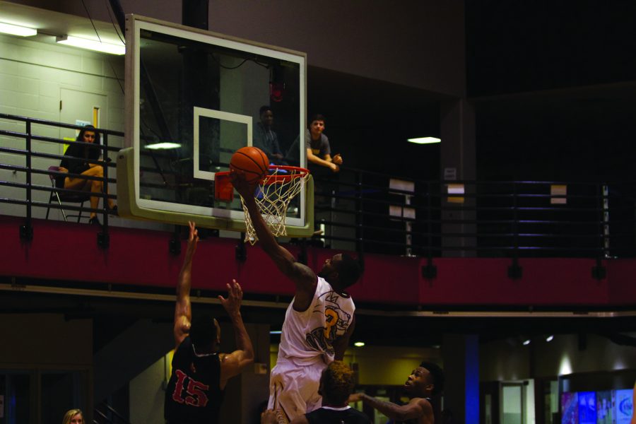 Business management senior Johnny Griffin Jr. rises up for a shot against William Carey College on Jan. 19, 2017. The Wolf Pack take on Blue Mountain College on Jan. 21 at First NBC Court. Photo credit: Marisabel Rodriguez