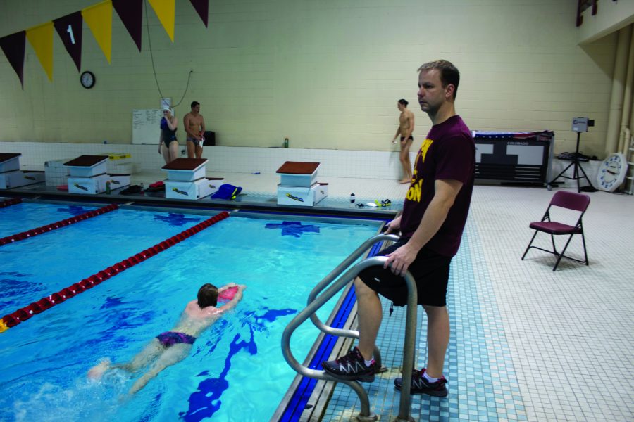 Thomas Natal, Head Coach, trains the Loyola swimmers as they eagerly improve their times and hone their technique.