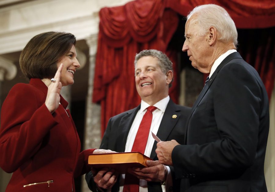 Vice President Joe Biden, right, administers the Senate oath of office to Sen. Catherine Cortez Masto, D-Nev., during a mock swearing in ceremony in the Old Senate Chamber on Capitol Hill in Washington, Tuesday, Jan. 3, 2017, as the 115th Congress begins. Cortez Masto is a Gonzaga University alumna and the first Latina woman elected to Congress. (AP Photo/Alex Brandon)
