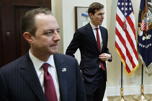 White House Chief of Staff Reince Priebus, left, and Jared Kushner, senior adviser to President Donald Trump, arrive for a meeting with business leaders in the Roosevelt Room of the White House in Washington, Monday, Jan. 30, 2017. (AP Photo/Evan Vucci)