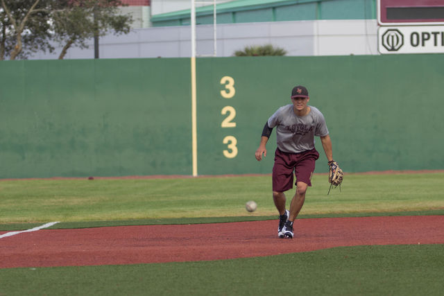 Loyola+Wolfpack+third+baseman+and+junior+Spencer+Rosenbohm%2C+practices+intercepting+a+ground+ball+at+the+John+A.+Alario+Sr.+Event+Center+baseball+diamond+in+Westwego%2C+during+practice+January%2C+14.+Rosenbohm%2C+who+is+pursuing+a+physics+major+said+he+looked+forward+to+the+season.+Photo+credit%3A+Osama+Ayyad