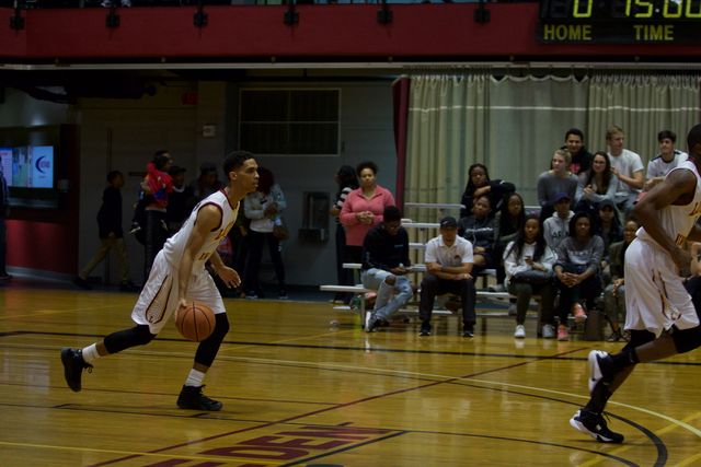 Jalen Gray, senior guard, moves up court in their game on Jan. 26. The Wolf Pack defeated Faulkner University on Saturday. Photo credit: Marisabel Rodriguez