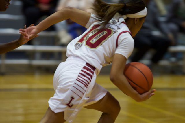 A Loyola player hustles up court in their game on Jan. 26. The Wolf Pack fell to Brenau University 85-78. Photo credit: Marisabel Rodriguez