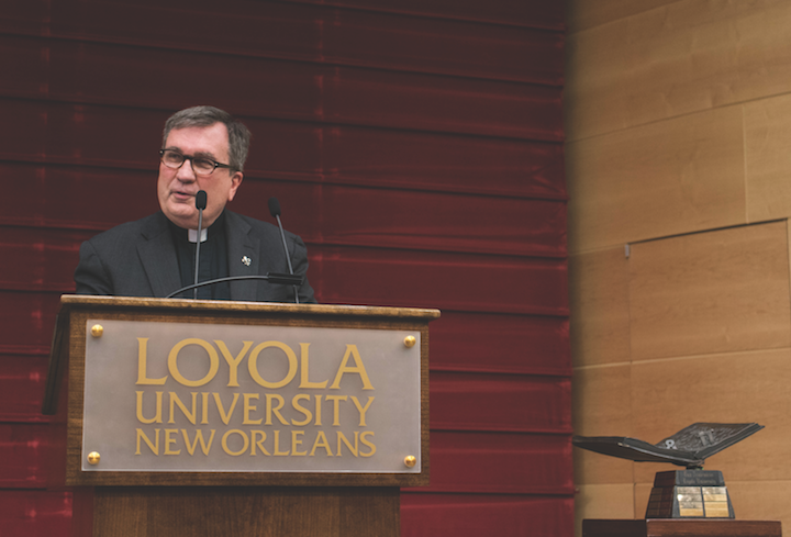 The+Rev.+Kevin+Wildes%2C+S.J.+speaks+to+faculty+and+staff+at+the+spring+convocation+in+Nunemaker+Hall%2C+Jan.+13.+Wilde+gave+a+statement+after+a+conflict+between+two+student+organizations.+