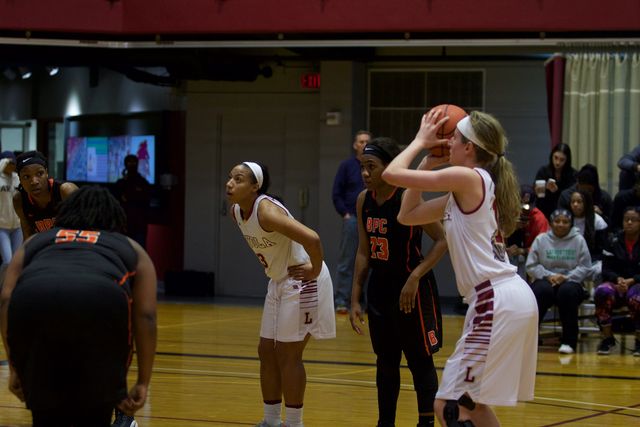 Freshman Mary Grace Copa shoots a free throw during her game on Jan. 26. The Wolf Pack were eliminated from the SSAC tournament on Friday. Photo credit: Marisabel Rodriguez