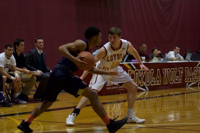 Sophomore Ethan Turner defends a player in his game on Jan. 26. The Wolf Pack enter the conference tournament with the fourth seed. Photo credit: Marisabel Rodriguez