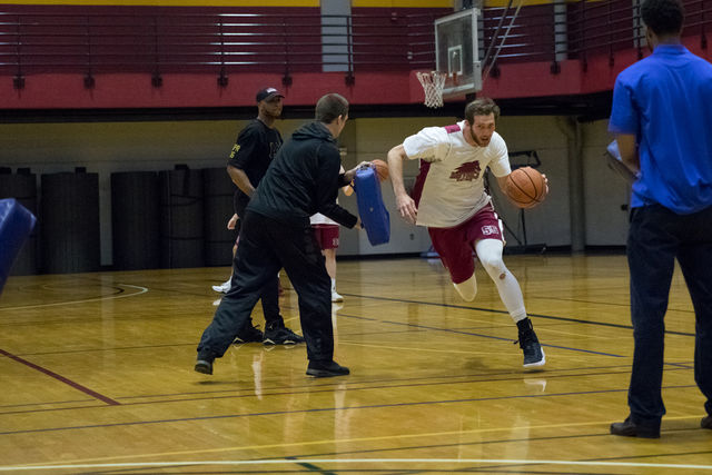 Nate Pierre, business senior, races toward the net during a drill. Pierre was named an NAIA scholar athlete this week for his work in the classroom. Photo credit: Osama Ayyad