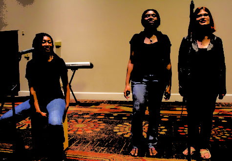 Moresa Robinson music therapy freshman, Rheyanna Lewis biology senior and Alicia Melendez music education junior perform during the Loyola Gospel Festival on Tuesday, Mar. 8, 2017. Photo credit: Alliciyia George