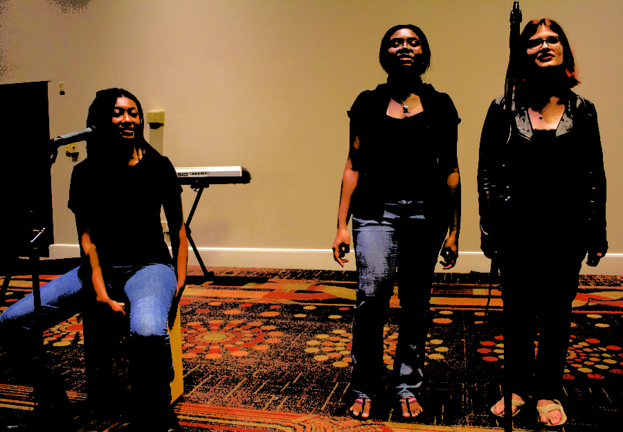 Moresa Robinson music therapy freshman, Rheyanna Lewis biology senior and Alicia Melendez music education junior perform during the Loyola Gospel Festival on Tuesday, Mar. 8, 2017. Photo credit: Alliciyia George