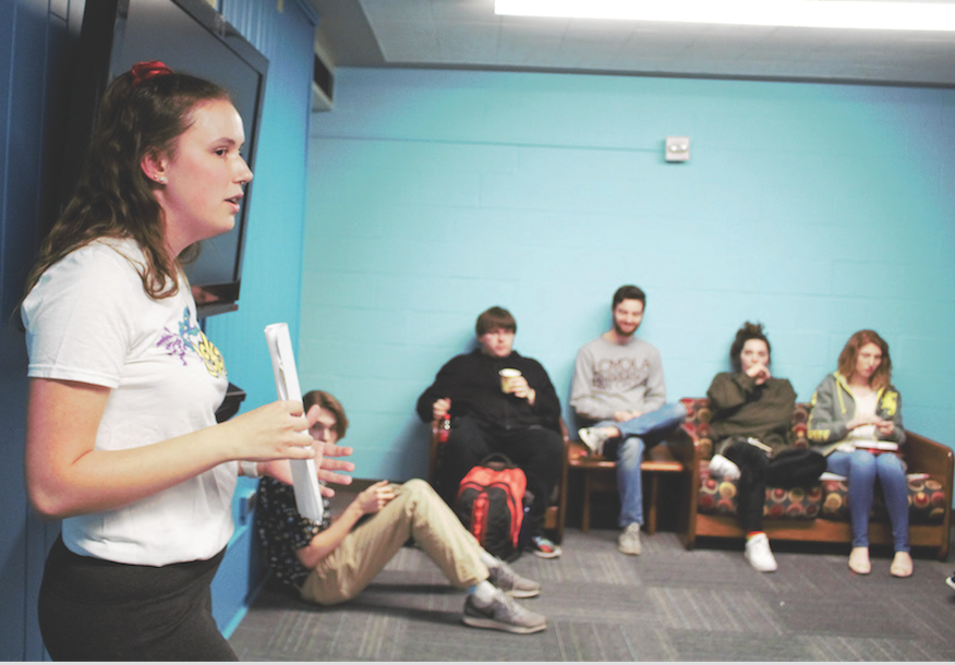 Nicole Schmidt, psychology sophomore, a Health Advocate talks during a floor meeting about alcohol safety. Photo credit: Alliciyia George