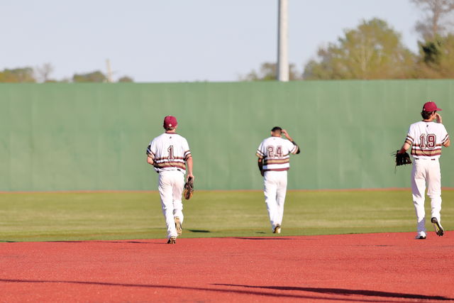 Business junior Rawlings Elam, business senior Alexander Lorenzo and business freshman Kevin Meehan take the field during tuesdays game against Louisiana State University-Alexandria. The Wolf Pack is set to play Blue Mountain College this friday March 24, 2017. Photo credit: Marisabel Rodriguez