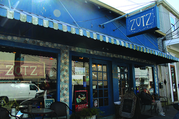 The front window of Zotz, a funky cafe on Oak street, near the Riverbend. Photo credit: Paulina Picciano