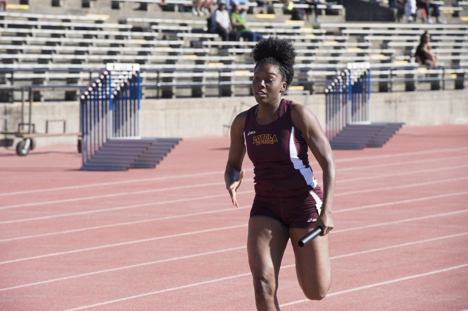 Beaunca Lewis sprints at the Tulane Twilight Invitational on March 4, 2016. The women's track and field team took second while the men's team took fourth at the conference championships. Photo credit: Courtesy of Loyola Athletics