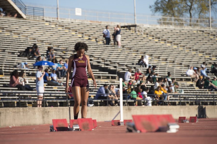 Biology+sophomore+Meri+Hebert+prepares+for+her+race+at+the+Tulane+Twilight+Invitational+on+March+4%2C+2016.+The+Wolf+Pack+broke+several+records+at+the+Southern+Mississippi+Invitational.