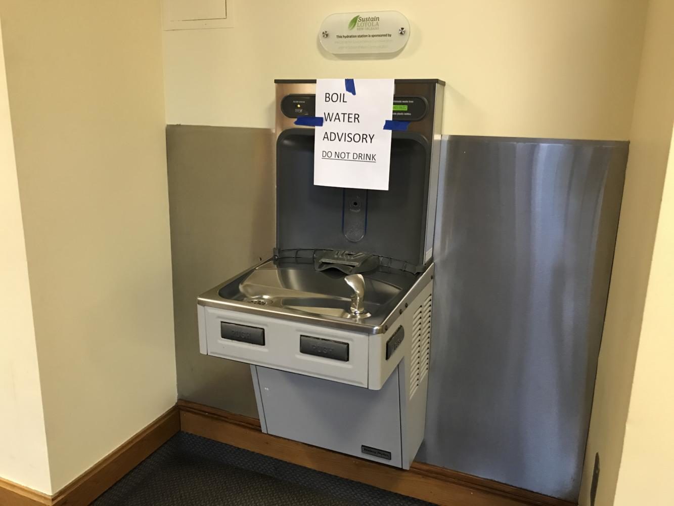 A sign warns not to drink from the water fountains in the Communications and Music Complex on Sept. 20, 2017. Photo credit: Nick Reimann