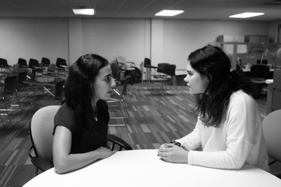 Senators Rana Thabata and Brianna Daniel-Harkins talk after an SGA meeting. Photo credit: Photo illustration by Erin Snodgrass