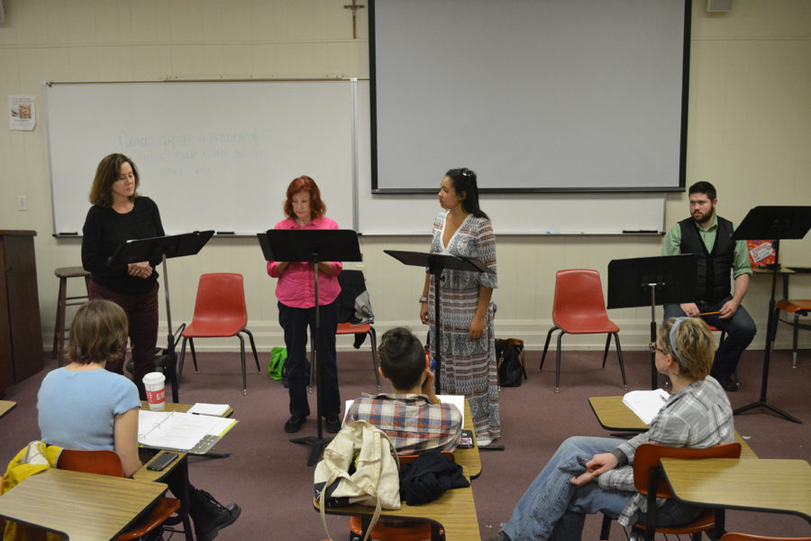(From left to right) Actors Leslie Castay, Janet Shea, Keyara Milliner and Matt Judd rehearse "The Witches Tower" by James Bartelle at Marquette Hall, Dec. 1, 2017. "The Witches Tower," along with three other plays, premiered Dec. 2. They are the result of the year-long 4D project at Southern Rep. (Photo by Davis Walden).