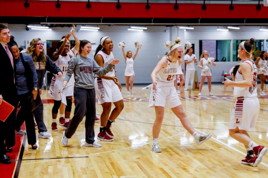 Junior, #23 Megan Worry celebrating with, freshman, #5 Savannah Ralph after the team won the game against Faulkner University in the Den on Jan. 20, 2018. The team is now 13-4 for the season. Photo credit: Jules Lydon