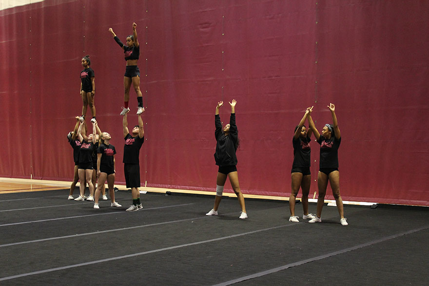 The+Loyola+cheerleading+team+rehearses+one+of+their+routines+during+an+early+morning+practice+Jan.+25%2C+2018.+The+team+is+perfecting+their+routine+in+anticipation+of+the+conference+finals+Feb.+3.+Photo+credit%3A+Cristian+Orellana