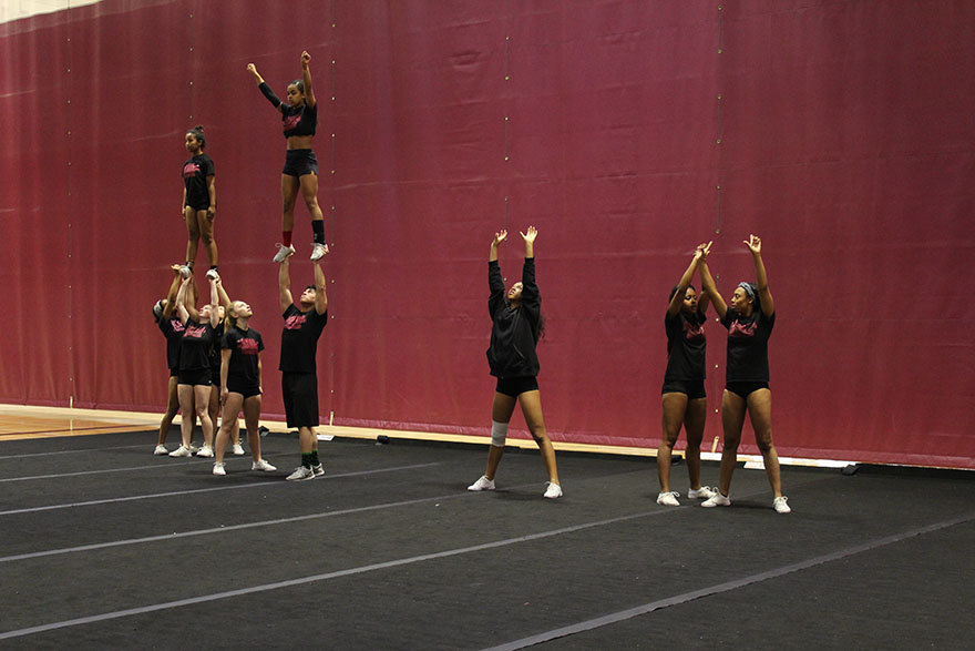 The Loyola cheerleading team rehearses one of their routines during an early morning practice Jan. 25, 2018. The team is perfecting their routine in anticipation of the conference finals Feb. 3. Photo credit: Cristian Orellana