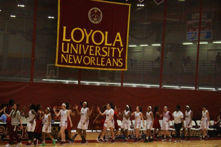 The+Loyola+womens+basketball+team+celebrates+their+win+vs.+William+Carey+University+Feb.+22+2018.+The+Wolf+Pack+beat+the+Crusaders+63-54.+Photo+credit%3A+Andres+Fuentes