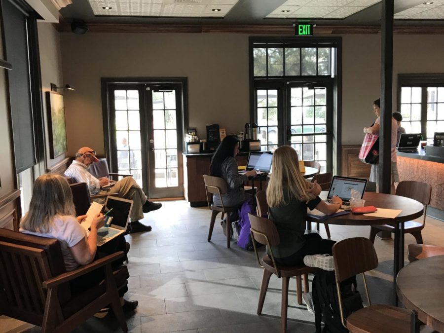 People work quietly on laptops, Feb. 21, 2018, in the new Starbucks location on Freret Street and Jefferson Avenue. At peak times, the coffee shop is often congested with students, both college and high school alike. Photo credit: Katelyn Fecteau