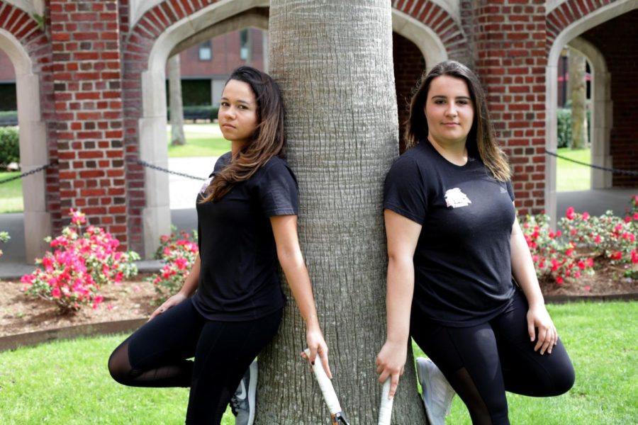 Koral Martinez, biology junior, and Isabel Junqueira, economics junior, are the veteran leaders on the Loyola tennis team. Their friendship stands as a reminder of home for them. Photo credit: Angelo Imbraguglio