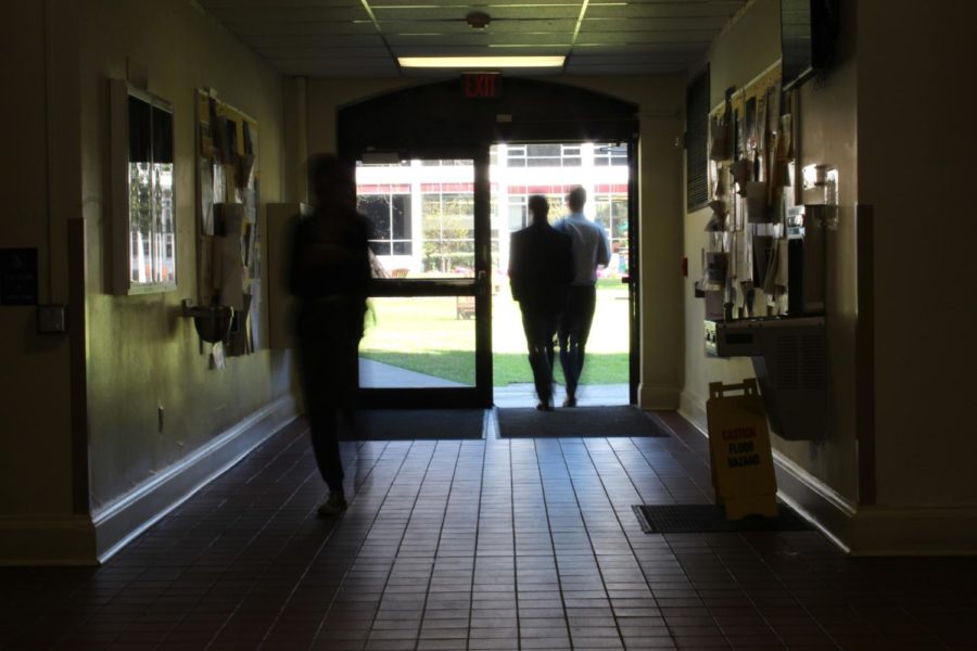 Loyola students walk out of Bobet Hall on March 7, 2018. The University Counseling Center is working to correct some myths about mental health at Loyola to show its commitment to all students. Photo credit: Cristian Orellana