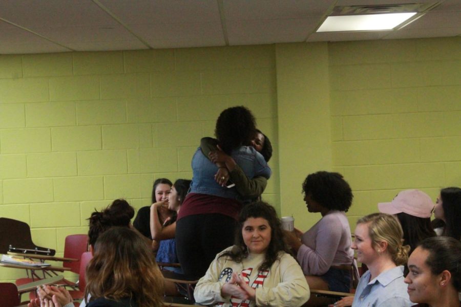 Sierra Ambrose and Joann Cassama share a hug after winning the SGA election on March 21, 2018.