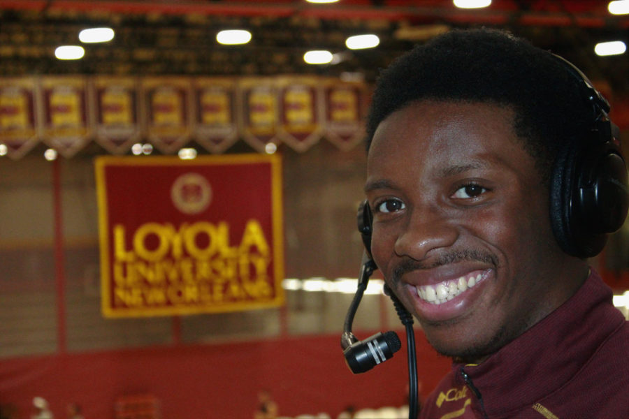 RoShae Gibson, mass communication sophomore, broadcasts live at home basketball and volleyball games. In his only second year on the job, Gibson hopes to expand his broadcasting to Loyola baseball. Photo credit: Paola Amezquita