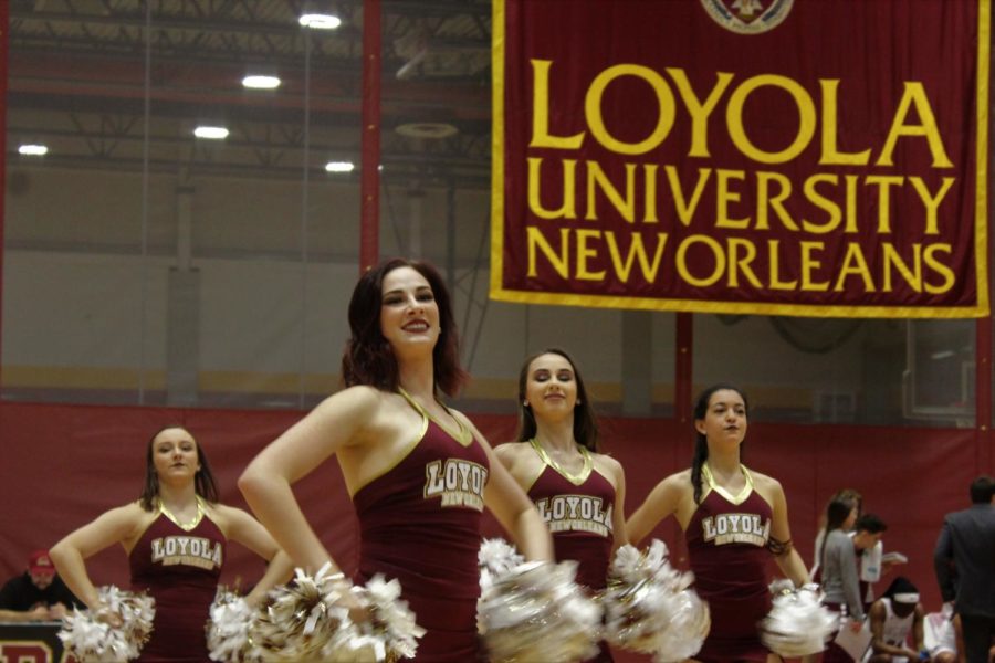 Elisabeth Cohen, music industry studies sophomore, leads the Loyola dance team during a halftime performance on Feb. 8 2018. The dance team has won an at-large bid to compete in the national tournament. Photo credit: Andres Fuentes