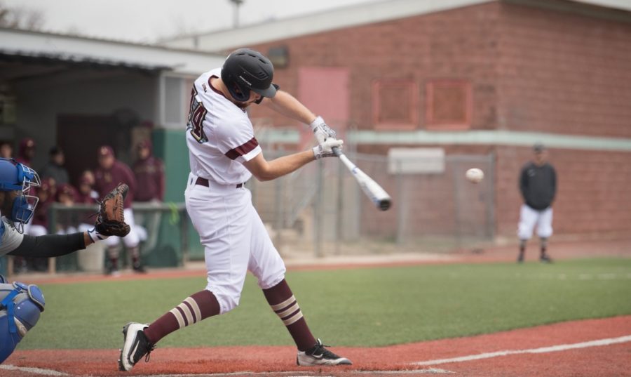 Ben Condara (14), general studies business senior, swings at a pitch. The Loyola baseball team split their series versus Brewton-Parker on April 6 2018. Photo credit: Loyola University Athletics