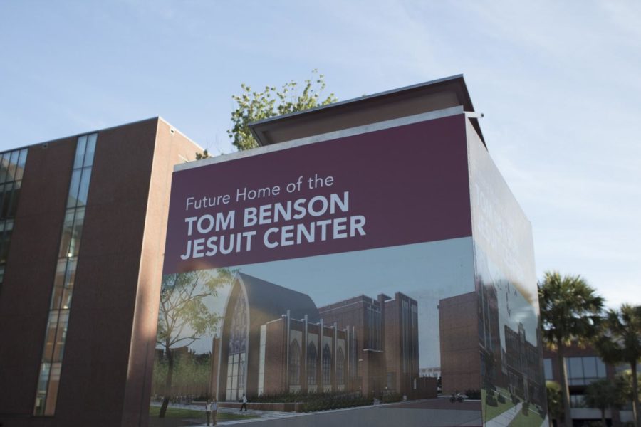 The sign for the future site of Tom Benson Jesuit Center stands between Monroe Hall and the sculpture garden. CHRISTIAN ORELLANA/The Maroon. Photo credit: Cristian Orellana