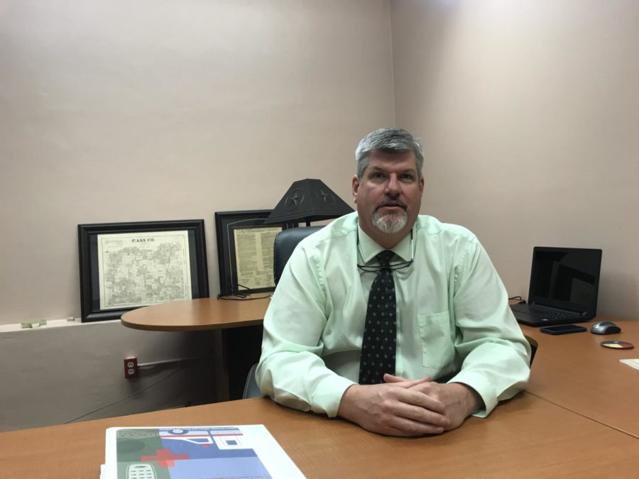 Director of Loyola University Police Department Todd Warren settles in to his new office on April 12, 2018. Warren brings 25 years of law enforcement experience. 