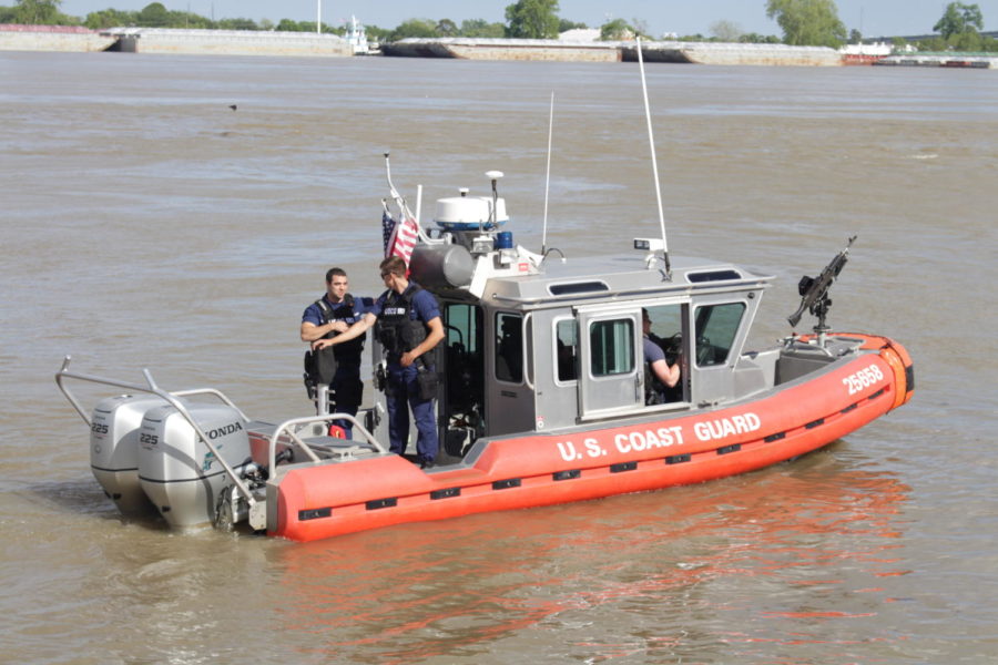 The U.S. Coast Guard monitor the impact from the oil spill Thursday afternoon. They shut down all traffic on the river and requested the RTA shut down the ferry leading from Algiers to Canal St.