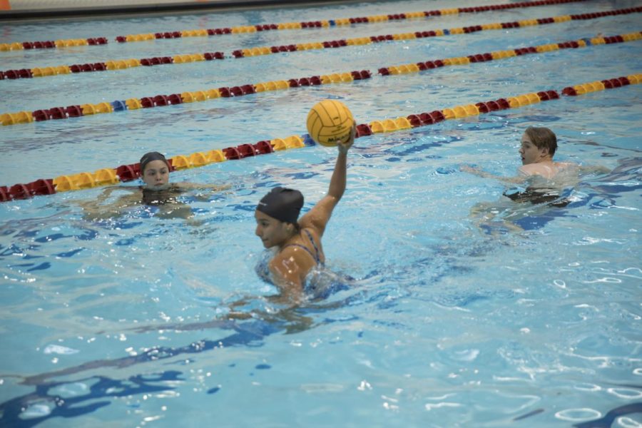 Dhalia Martinez, biology sophomore, takes a shot at a water polo goal during practice on April 4, 2018. Martinez and Aubrey Palhegyi, buisness management senior, both took the reigns of the club sport when their coach could no longer attend practice. Photo credit: Cristian Orellana