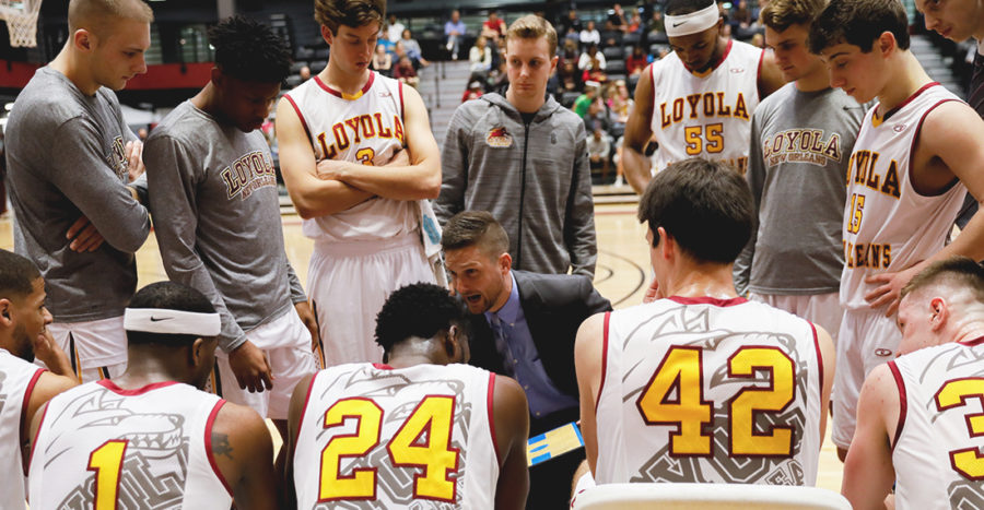 Head coach, Stacy Hollowell, talks strategy to Loyolas Mens Basketball team during the Jan. 20, 2018, game against Faulkner University. Loyola won the game by 12 points. JULIA SANTOS/The Maroon.