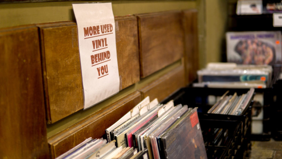 In case anyone meandering into Skully'z overlooks the floors littered with re-purposed milk crates holding vinyl sleeves, this sign stands as a reminder to those who might look for a bargain on second-hand records. Photo credit: Jacob Meyer