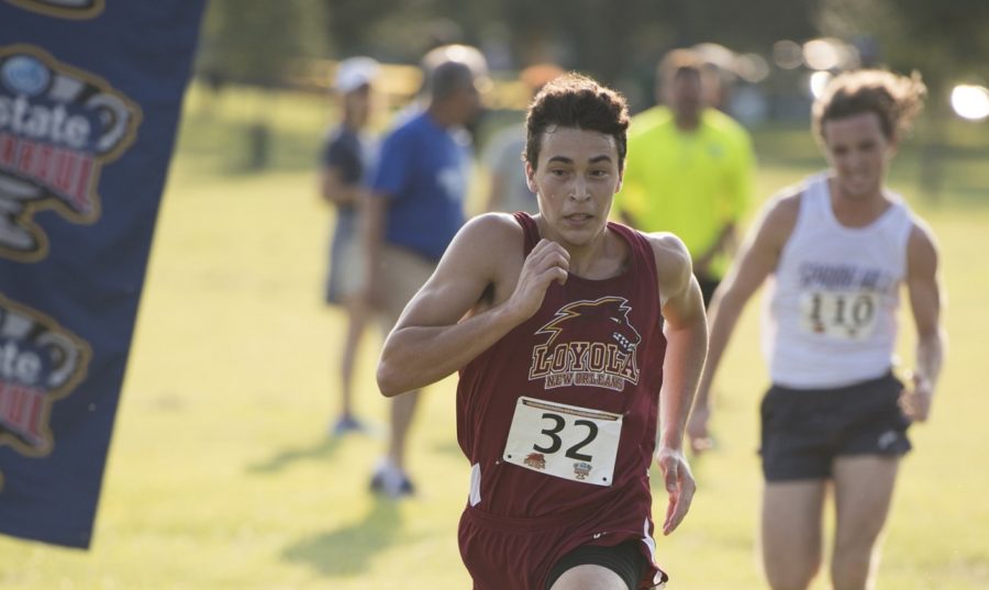 Psychology sophomore Hayden Ricca sprints for the finish. Ricca finished in third place at the Nicholls Invitational. Photo credit: Loyola New Orleans Athletics