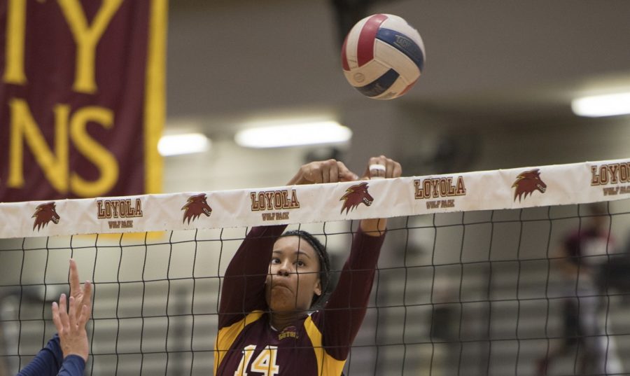 Mass+communication+junior+Tyler+Beckham+goes+for+a+block.Beckham+finished+with+12+kills+against+Bethel+University+and+13+kills+against+Martin+Methodist.+Photo+credit%3A+Loyola+New+Orleans+Athletics