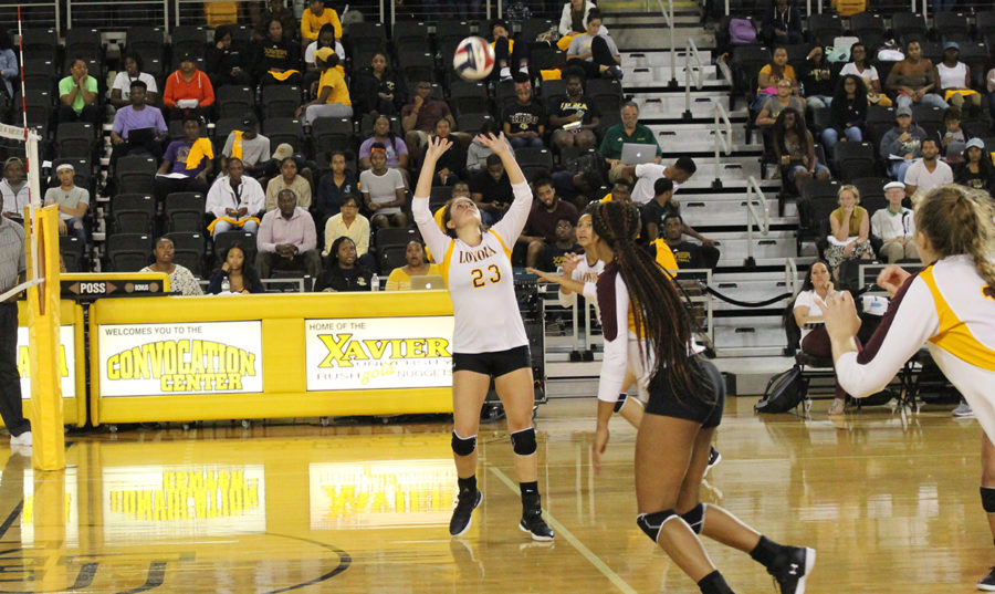 Education senior Maddie Huekels sets up for a possible kill. Huekels was named Southern States Athletic Conference Setter of the Week. Photo credit: Loyola New Orleans Athletics