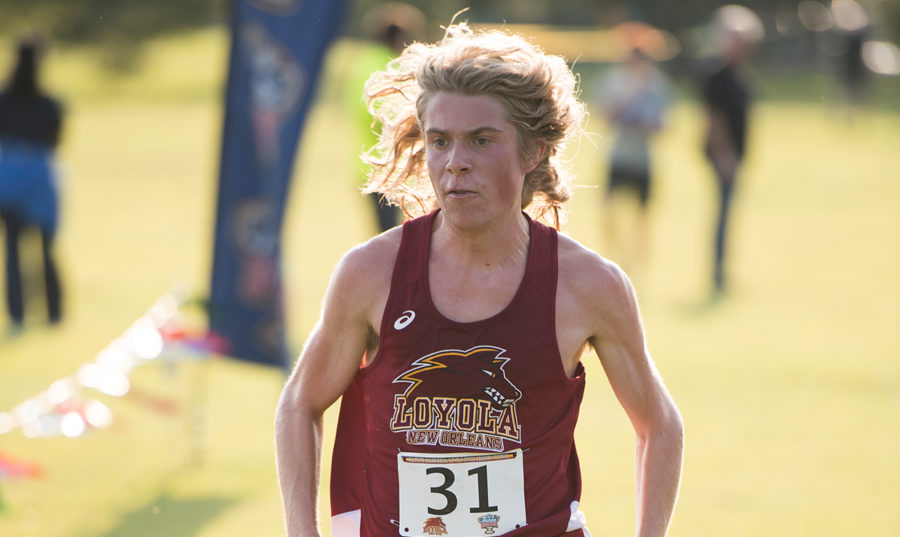 Environmental studies sophomore Walter Ramsey runs in the Allstate Sugar Bowl Festival. Ramsey finished third overall in the men's 5k. Photo credit: Loyola New Orleans Athletics