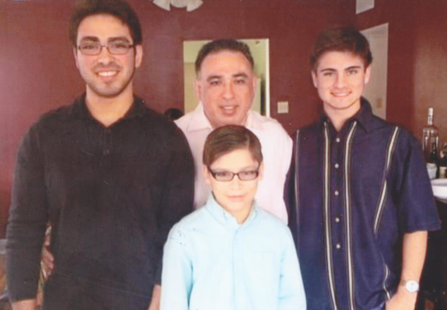 Andres Fuentes (left), Alejandro Fuentes (bottom center), Armando Fuentes (right) and Cesar Fuentes (middle) enjoying quality family moments Thanksgiving, 2014. Fuentes is proud to be Hispanic. Courtesy of Andres Fuentes. Photo credit: Andres Fuentes