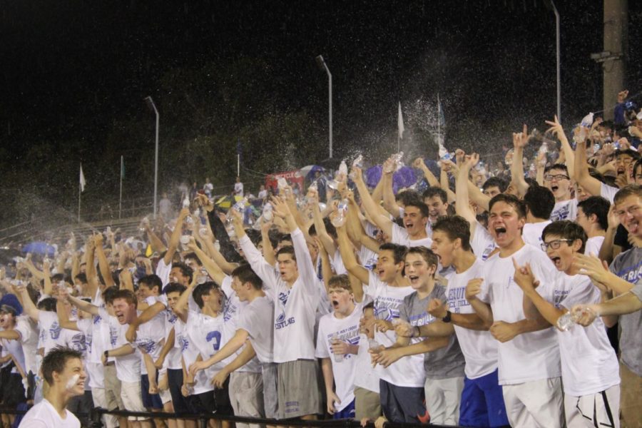 Jesuit students cheer as their team battles Holy Cross at the Jesuit Holy Cross Rivalry game on Sept. 28, 2018. This was the 99th rivalry game in the series. Photo credit: Natalie Wolfe